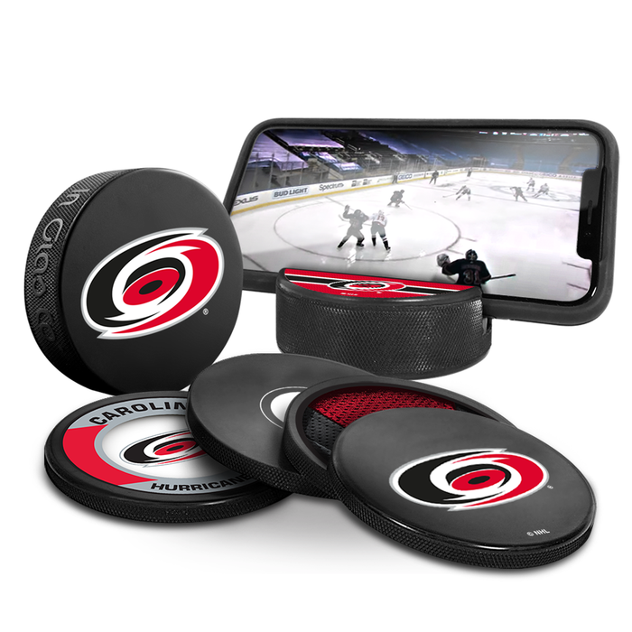 Coffret de 3 souvenirs de la LNH des Hurricanes de la Caroline. Comprend : 1 rondelle de hockey classique officielle de la LNH, 4 sous-verres et 1 support pour appareil multimédia.