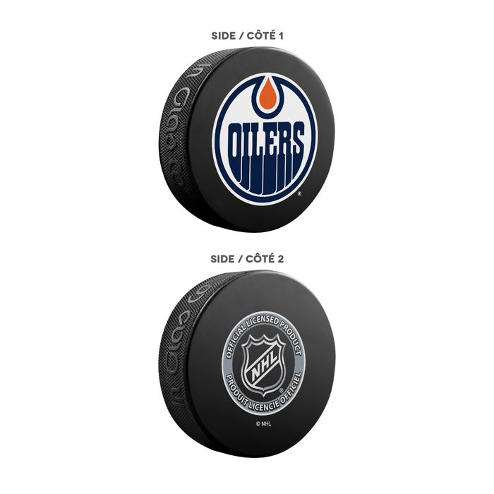 Coffret de 3 souvenirs de la LNH des Oilers d'Edmonton. Comprend : 1 rondelle de hockey classique officielle de la LNH, 4 sous-verres et 1 support pour appareil multimédia.