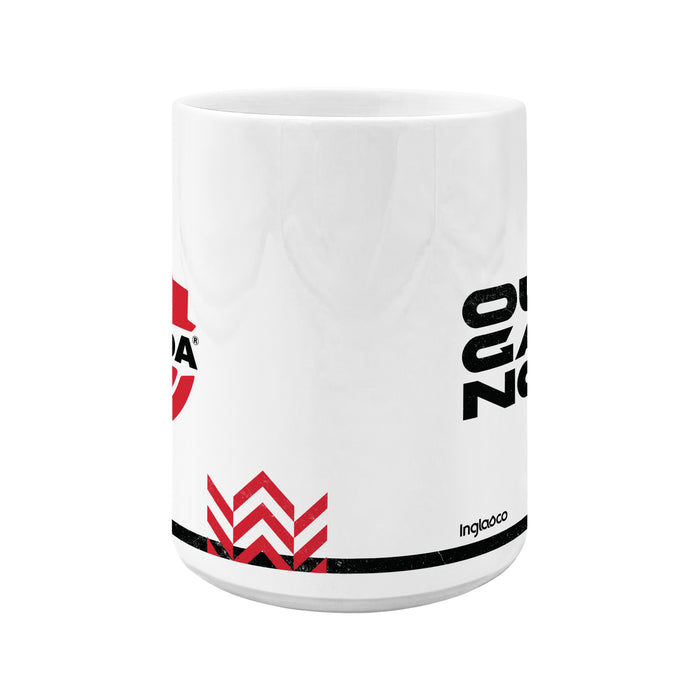 Canada Soccer 15 oz ceramic mug side profile showing crest and slogan wrapping around the white body