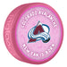 NHL Colorado Avalanche New Fan Is Born pink souvenir hockey puck with team avalanche A logo on baby-themed background