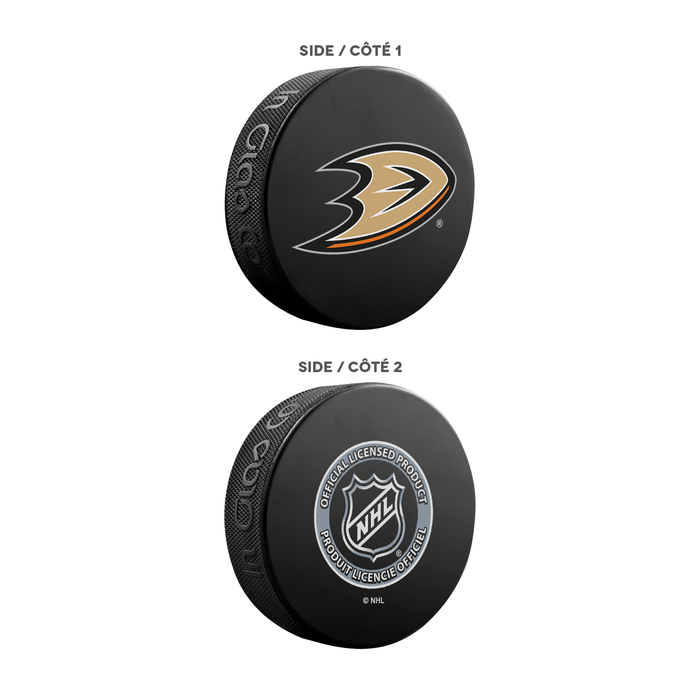 Coffret de 3 souvenirs de la LNH pour les Ducks d'Anaheim. Comprend : 1 rondelle de hockey classique officielle de la LNH, 4 sous-verres et 1 support pour appareil multimédia.