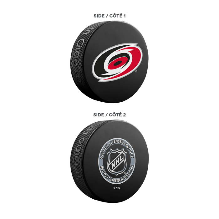 Coffret de 3 souvenirs de la LNH des Hurricanes de la Caroline. Comprend : 1 rondelle de hockey classique officielle de la LNH, 4 sous-verres et 1 support pour appareil multimédia.