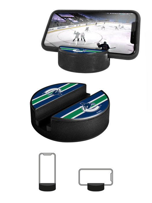 Coffret de 3 souvenirs de la LNH pour les fans des Canucks de Vancouver. Comprend : 1 rondelle de hockey classique officielle de la LNH, 4 sous-verres et 1 support pour appareil multimédia.