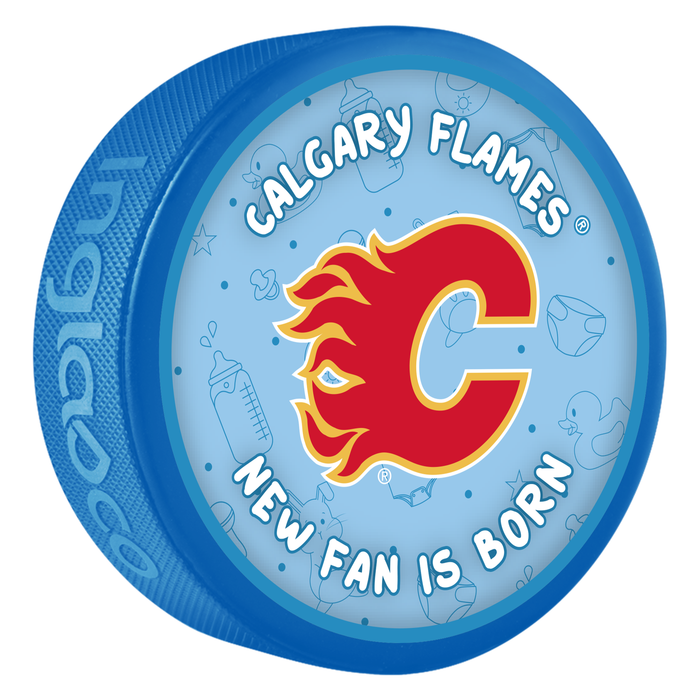 NHL Calgary Flames New Fan Is Born blue souvenir hockey puck with red flaming C logo on baby-themed background