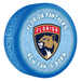 NHL Florida Panthers New Fan Is Born blue souvenir hockey puck with red and gold panther shield logo on baby-themed background