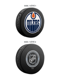 <transcy>Pack de 3 fans ultimes des Oilers d'Edmonton de la LNH. Comprend : 1 rondelle de hockey souvenir classique officielle de la LNH / 4 sous-verres / 1 support pour appareil multimédia</transcy>