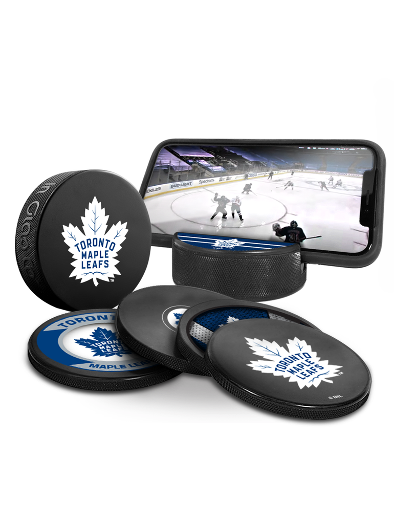 <transcy>Ensemble de 3 fans ultimes des Maple Leafs de Toronto de la LNH. Comprend : 1 rondelle de hockey souvenir classique officielle de la LNH / 4 sous-verres / 1 support pour appareil multimédia</transcy>